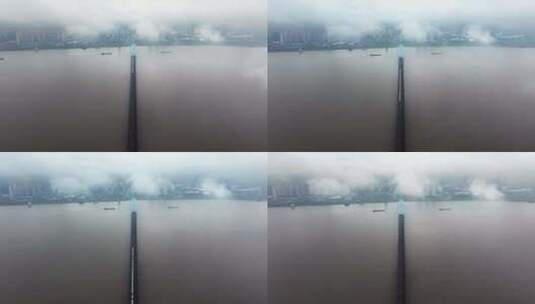 云雾下的高铁穿过江河高清在线视频素材下载