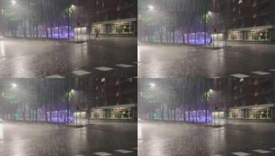 一个人在倾盆大雨中过马路高清在线视频素材下载