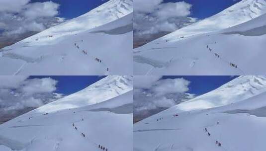 航拍冰川之父慕士塔格峰雪山冰川上的登山队高清在线视频素材下载