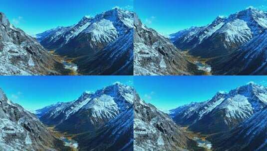 雪山下多彩树林与湖泊相映的美景高清在线视频素材下载