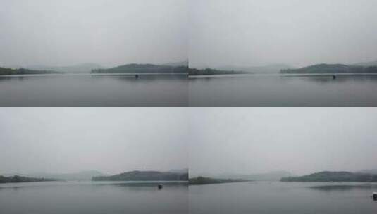 烟雨蒙蒙山湖水船飞向前高清在线视频素材下载