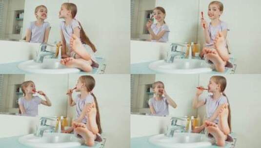 小女孩在洗手台上照镜子高清在线视频素材下载