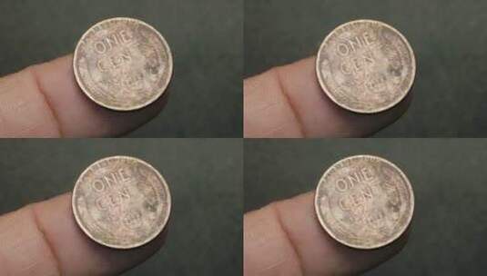 手指上的旧硬币高清在线视频素材下载