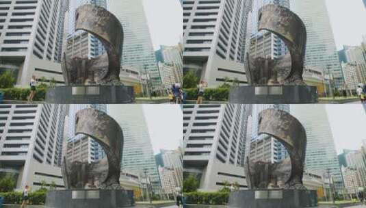 新加坡城镇前的雕塑高清在线视频素材下载
