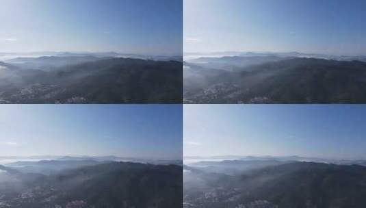 航拍清晨山间云雾缭绕云层之上高清在线视频素材下载
