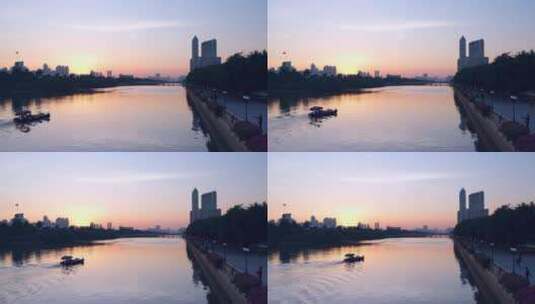 日落黄昏一艘游船行驶在广州珠江上高清在线视频素材下载