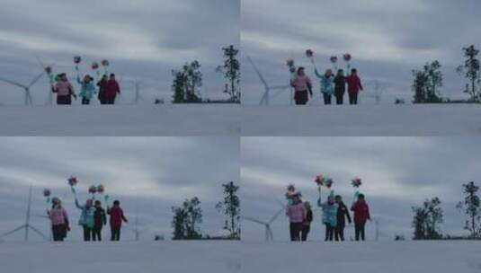 一群小朋友拿着彩色风车奔跑高清在线视频素材下载