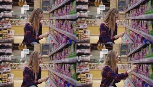 女人在超市选购零食高清在线视频素材下载