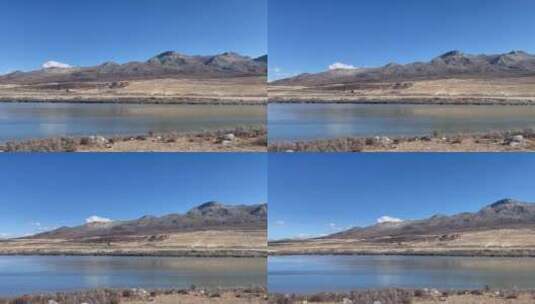 蓝天白云焦糖色草原摇河流湖泊雪山高清在线视频素材下载