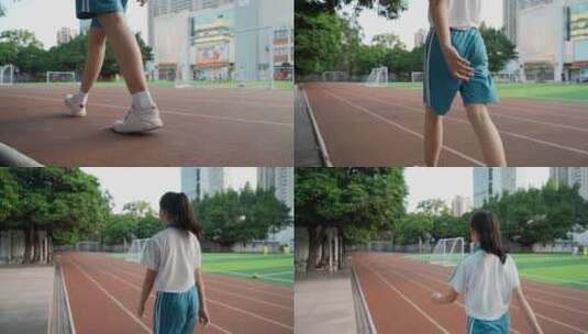 深圳小学生在球场跑道上行走高清在线视频素材下载