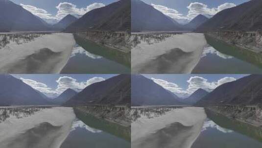 西藏派墨公路雪山高山湖泊道路车辆航拍高清在线视频素材下载