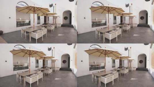 咖啡店户外遮阳伞和桌子椅子高清在线视频素材下载