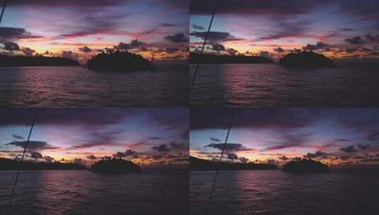 班达海令人难以置信的日落，从一艘船上看到，相机飞驰而去。高清在线视频素材下载