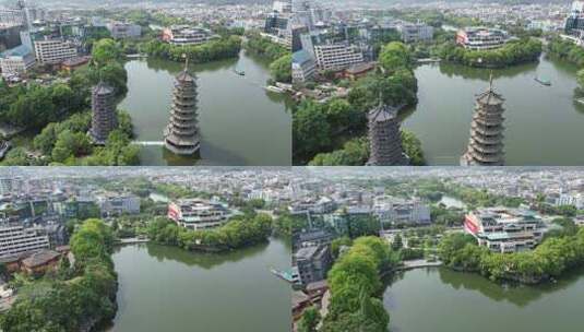 航拍广西桂林日月双塔地标建筑高清在线视频素材下载