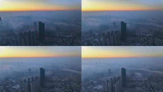 中国辽宁沈阳金廊恒大世界城平流雾日出高清在线视频素材下载