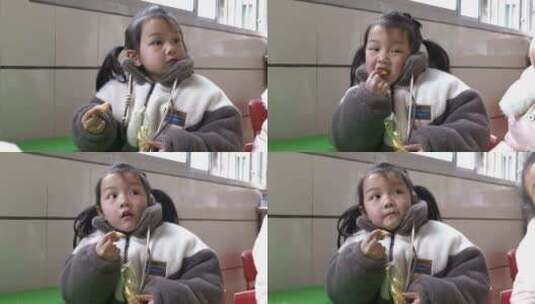 小女孩吃零食高清在线视频素材下载