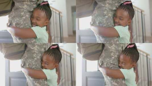 非裔美国女儿拥抱穿着军装的父亲高清在线视频素材下载