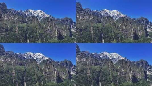 燕子沟航拍四川第二高峰中山峰雪山河谷风光高清在线视频素材下载