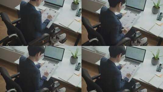 坐轮椅在笔记本电脑前检查商业文件的女专家高清在线视频素材下载