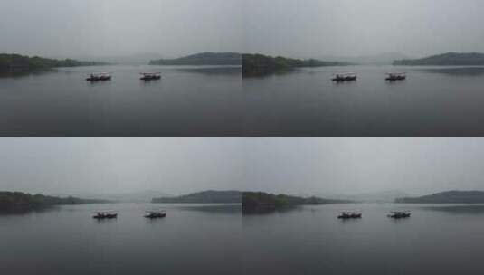 烟雨蒙蒙山湖水游船西湖高清在线视频素材下载