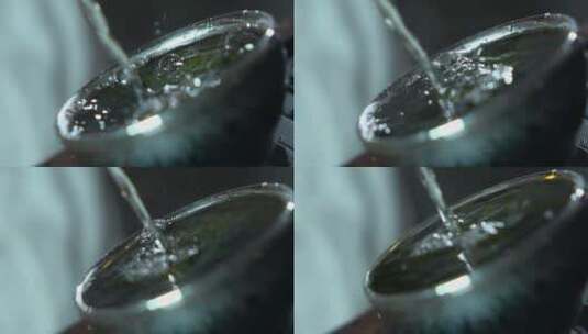 水滴慢镜头视频建盏茶杯茶水高清在线视频素材下载