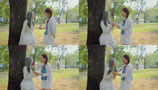 两位年轻的亚洲恋人用玫瑰带来由衷的惊喜。高清在线视频素材下载