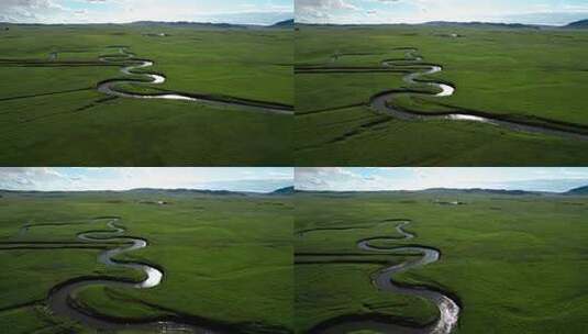 航拍内蒙古千里草原上蜿蜒的溪流九曲湾高清在线视频素材下载