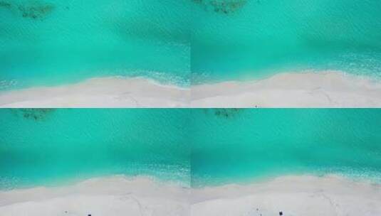 航拍白色沙滩与蓝色大海高清在线视频素材下载