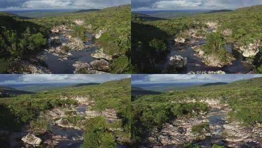 无人驾驶飞机多莉在一条令人难以置信的岩石和多风的河流上方飞行高清在线视频素材下载