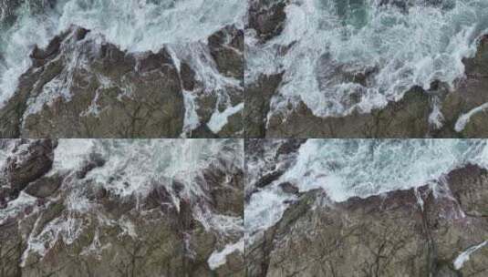 泰国普吉岛海水冲击礁石溅起浪花特写镜头高清在线视频素材下载