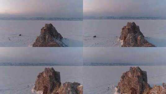 日落时分的沙曼卡岩石奥尔洪岛航拍冰冻贝加高清在线视频素材下载