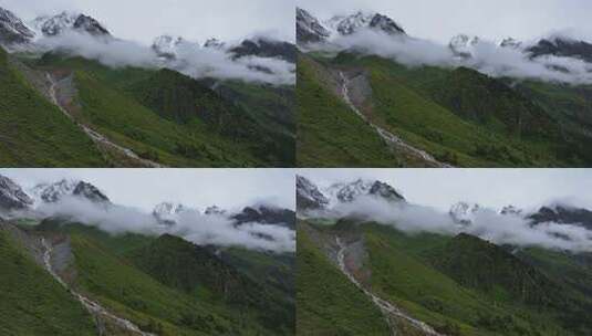 四川甘孜海螺沟景区航拍的金银山雪山风光高清在线视频素材下载