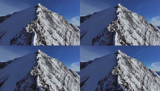 航拍四川岷山山脉雪宝顶雪山山脊上的登山队高清在线视频素材下载