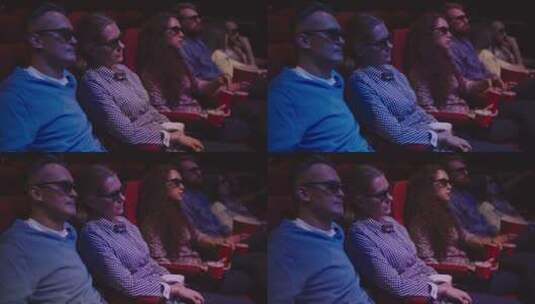 在电影院的观众戴3D眼镜看电影高清在线视频素材下载