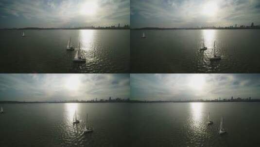 武汉东湖帆船航行夕阳高清在线视频素材下载