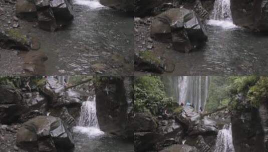 游客参观森林的瀑布高清在线视频素材下载