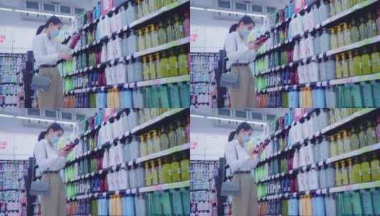 戴口罩的青年女人在超市选购洗护用品高清在线视频素材下载