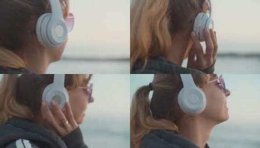 女孩戴着耳机听音乐的特写镜头高清在线视频素材下载