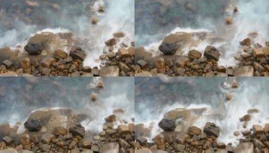 延时拍摄浪花拍打岸边的岩石高清在线视频素材下载