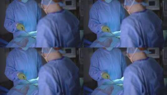 两名外科医生为手术中的病人做手术高清在线视频素材下载