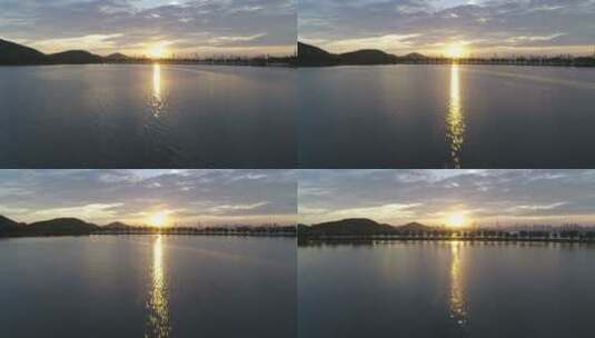 航拍武汉东湖绿道傍晚湖面夕阳光影高清在线视频素材下载