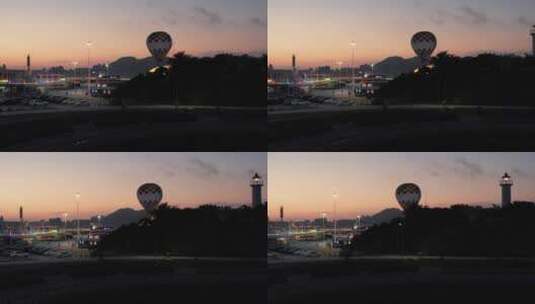 航拍傍晚时分的威海金线顶灯塔高清在线视频素材下载
