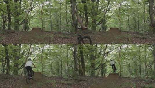 无人驾驶飞机跟踪骑山地自行车的人高清在线视频素材下载