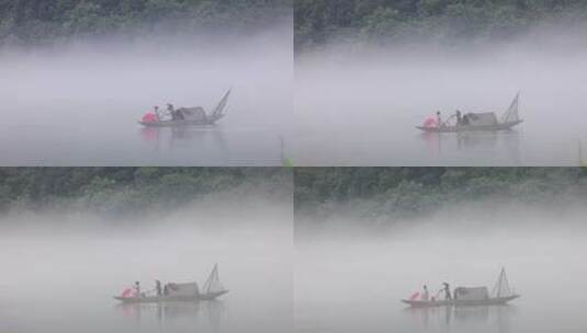 江面渔舟晨雾女子划船乘舟撑伞唯美风光高清在线视频素材下载