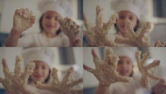 小女孩在厨房玩面粉高清在线视频素材下载