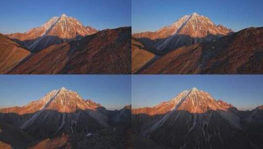 川西雅拉雪山日落日照金山航拍高清在线视频素材下载