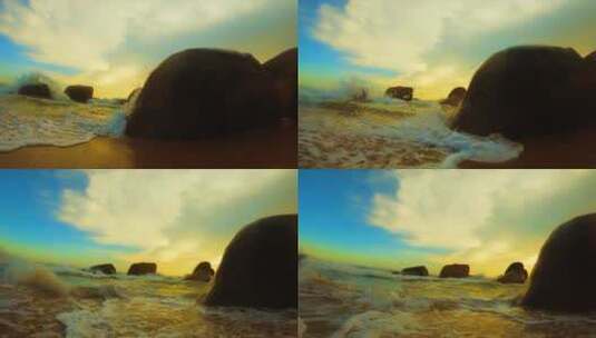 三亚海角天涯海滩岩石日落高清在线视频素材下载