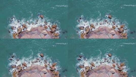 俯拍海浪拍打礁石高清在线视频素材下载