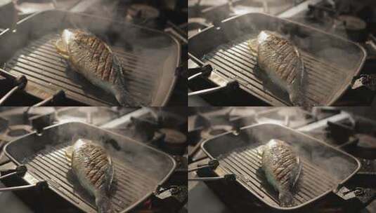 蒸汽云上锅上的宏鱼油炸高清在线视频素材下载