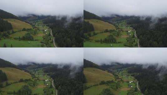 雾中山谷村庄的鸟瞰图高清在线视频素材下载
